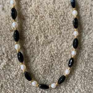 Two strands black/pearl/gold costume jewelry